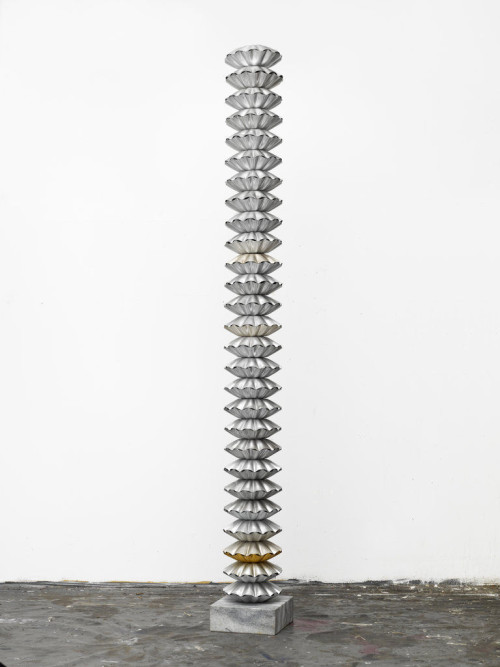 
     <i>Fine Art in Silver (Filme)</i>, 
     2012<br />
     compression-molded records, metal bar, marble plinth, 
      262 x 31 x 31 cm<br />
     