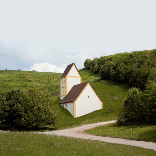 
     <i>Versunkenes Dorf</i>, 
     2004-06<br />
     Concrete, plaster, paint, 
      16.7 m x 9 m x 18.4 m<br />
     Sunken Village Replica of a church as part of a village that was completely destroyed for a designated pile of rubbish area.